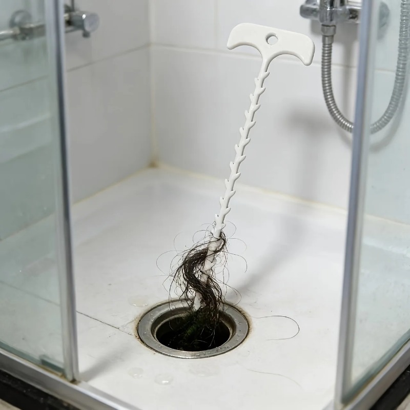 قطعتان من أداة تسليك الأنابيب  - مراجعة Root Hook Tool وسعره
