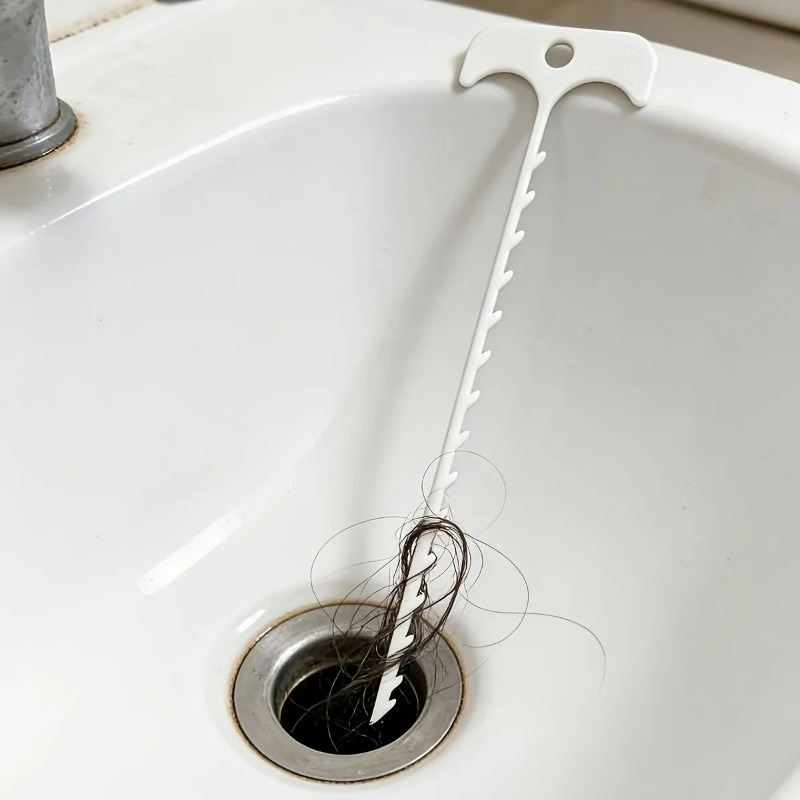قطعتان من أداة تسليك الأنابيب  - مراجعة Root Hook Tool وسعره